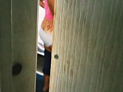 Watching my sister-in-law masturbating and wearing a thong through the door