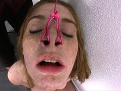 Freckled Freak Faye Reagan gets tied up and spit-roasted in bondage