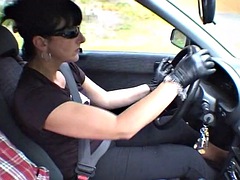 Smoker with gloves driving a car