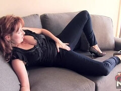 Redhead wife teases in tight blue jeans