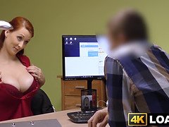 Redhaired stunner shows off big jugs before office beating