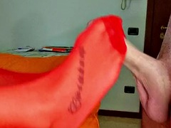 Big cock in red socks cums on feet