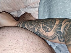 Tattooed stepmom jerks off stepsons cock, making him feel like a king