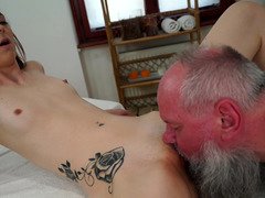 Old masseur with shaggy beard licks and fucks client's pussy