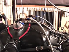 CFNM femdom MILF in latex teases bound sub with cock pump