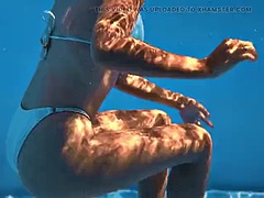 Sophie Otis takes a sexy dip in the pool