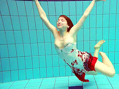 steaming polish red-haired swimming in the pool