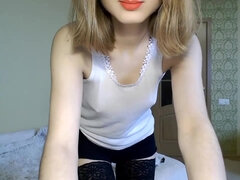 Cute teen Lina in glasses on webcam