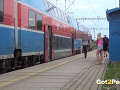 Blonde hottie caught peeing on the train platform & begs for a quickie