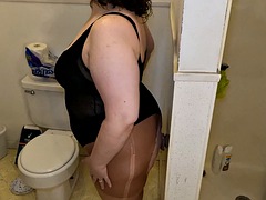 Taracarider takes a dildo on the wall in the ass in the bathroom