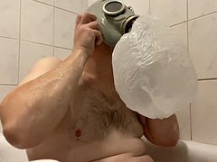 BHDL - N.V.A. BREATHTUB - LATEX GAS MASK BREATHING IN THE BATHTUB AND CUMMING TWICE