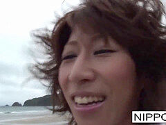 japanese hottie blows her fellow at the beach