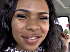 Solo ebony tranny uses a dildo while masturbating