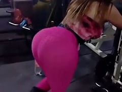 Tranny working out in the gym with a big cock