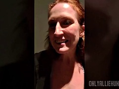 Redhead mom fucks her ass and hairy pussy with a dildo in the Planet Fitness shower
