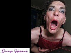 Sissy slave Denise Humain works her mouth with a dildo in training. Sexy