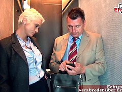 German blonde MILF with big tits and short hair does anal in an elevator