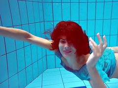 Beautiful redhead hairy pussy underwater