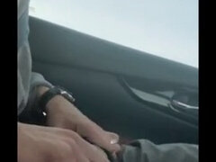 Johnholmesjunior shooting load of cum while driving on the highway in slow motion