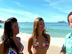 Brazilian bikini babe flaunts her thong on the beach