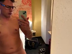 Sweet German guy masturbates early in the morning in the hotel room and cums on the bed