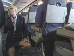 Stewardess fellates shaft on flat