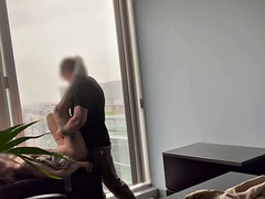 MILF boss fucked at her office window