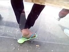 candid bare feet with flip-flops waiting bus High definition