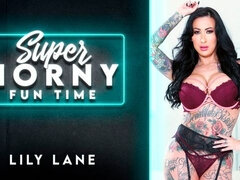 Busty tattooed model Lily Lane fucks with a big purple dildo