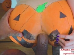 halloween pumpkin getting romped by dark-hued meatpipe