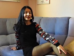 Sexy italian vlogger tries on black pantyhose