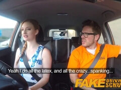 Kinky redhead with massive fake boobs gets a hot facial in fake driving school