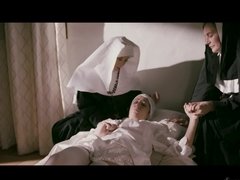 Sexy nuns are playing with each other in front of the camera