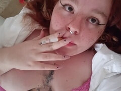 Smoking teen experiences multiple orgasms followed by a massive facial cumshot