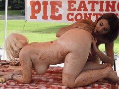 Pie eating contest ends up in messy lesbian sex