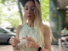 Risky public masturbation with a stunning girl in a crowded café on a busy street - no bra, transparent top, and no panties!