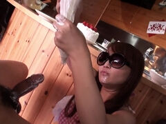 Asian babe with sunglasses has naughty fun in the kitchen