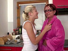 warm mature and teenager lesbian vignette on the kitchen