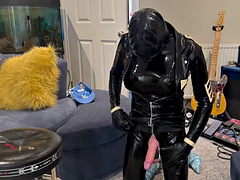 Mistress cums while covered from head to toe in layers of latex