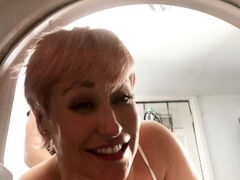 Short-haired blonde MILF stretched by BF in laundry room