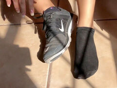 sweat-soaked dark-hued Socks Removal Sweaty soles Close Up