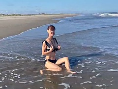 Striptease and naked dance on the beach, she loves being completely naked
