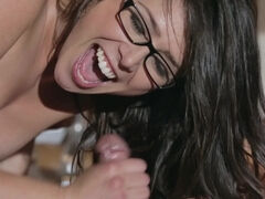 A bimbo with glasses is getting fucked in her wet and tight snatch