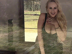 lady with hefty pierced jugs masturbates in front of a window cleaner.