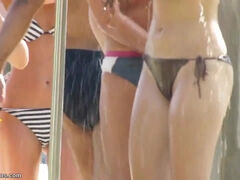 Magnificent Swimsuit Gals Tanning At The Pool