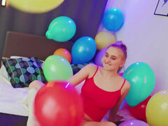 Balloon popping teaser shows her big naturals as well