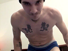 tattooed homosexual thug plays with his enormous shaft solo