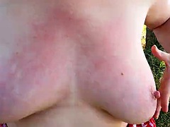 Blouse down - tits slapped by the lake