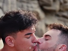 Passionate kissing outdoors before the orgy