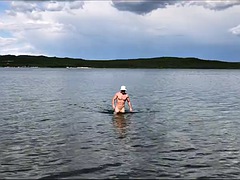 I WAS ALMOST NOTICED  NAKED swimming and secret MASTURBATION on a public beach